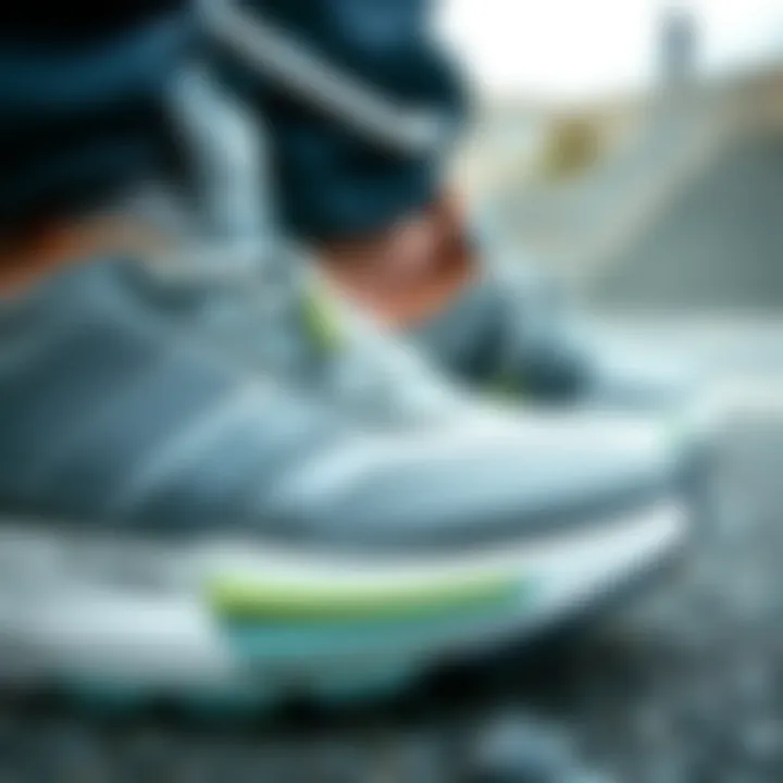 Performance Features of Adidas Grey-Green Sports Shoes Close-up of the performance features of Adidas shoes