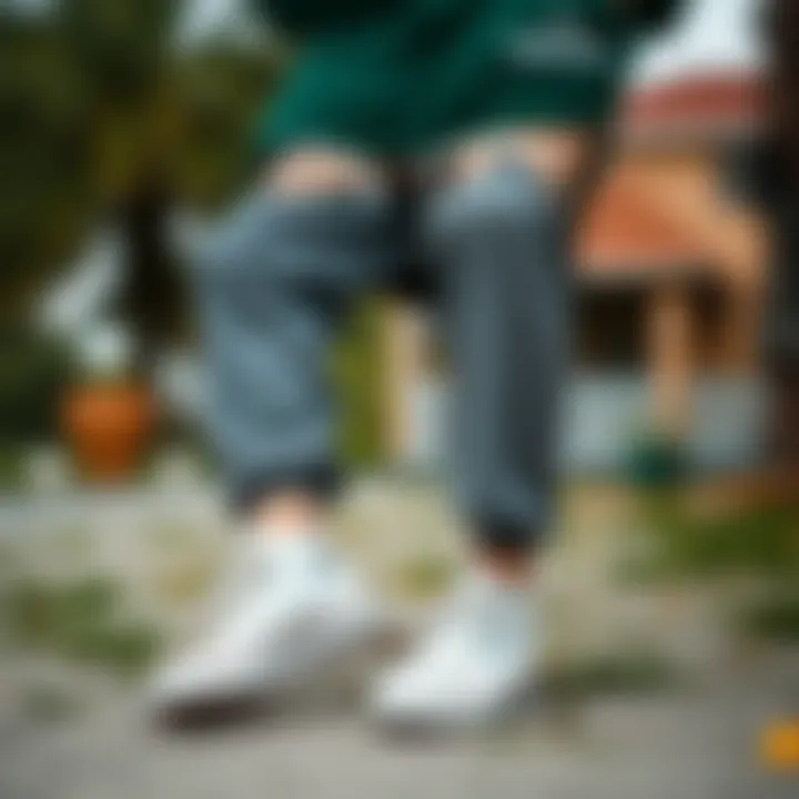 Athletic outfit paired with white Converse in an outdoor setting