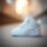 Stylish white Nike baby shoes designed for comfort and aesthetics.