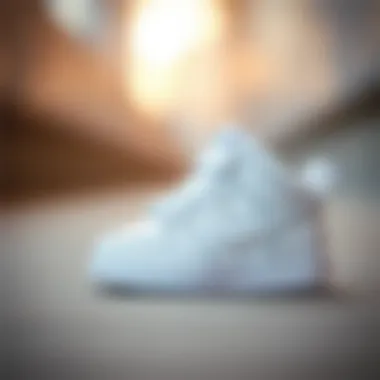 Stylish white Nike baby shoes designed for comfort and aesthetics.