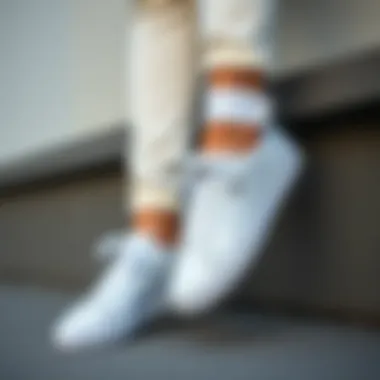 Fashionable outfit combinations featuring Puma white sneakers