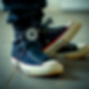 A well-maintained pair of black high-top Converse demonstrating care techniques.