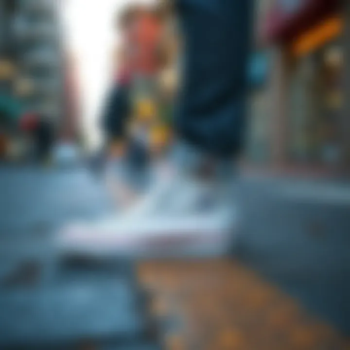 Stylish white Converse shoes on a city street