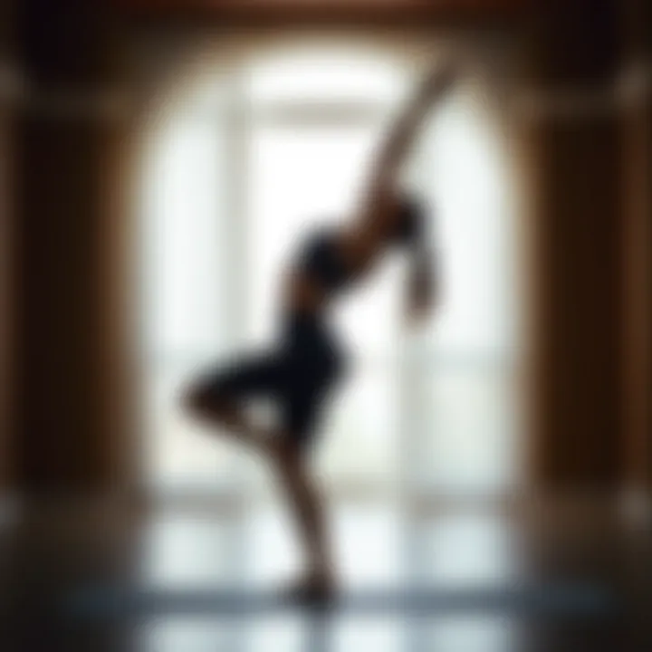 A woman performing yoga, wearing long-legged shorts that complement her athletic build.